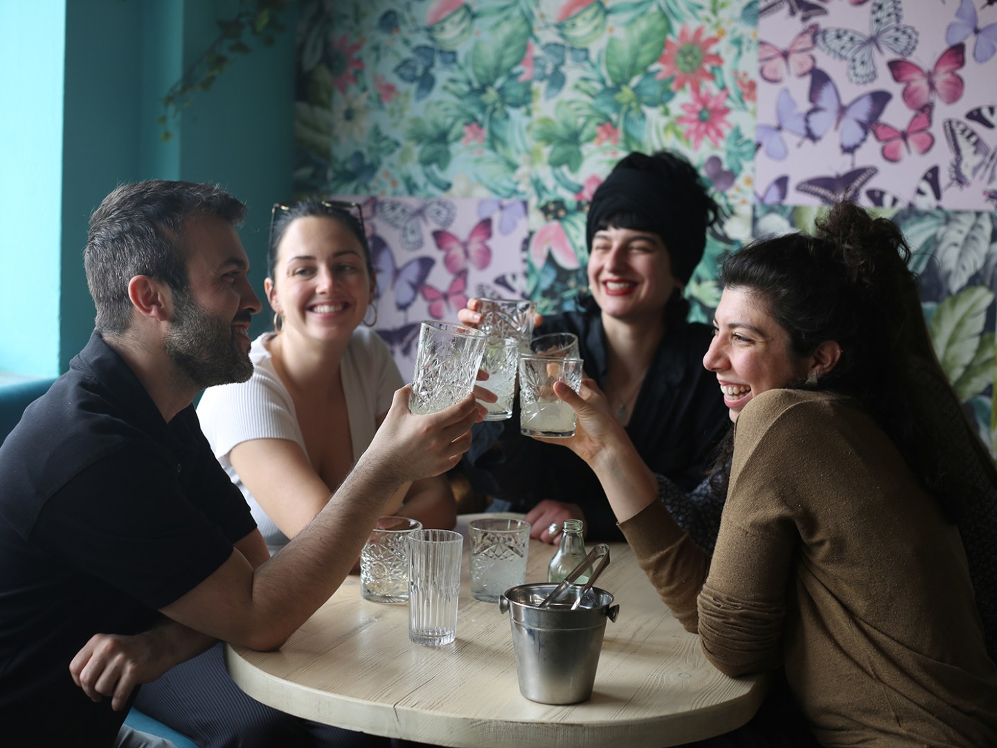 a group of people sitting at a table