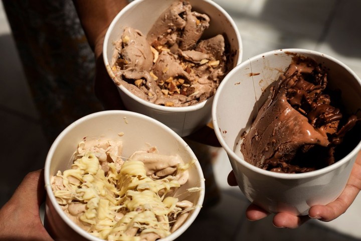 a plate of food and a cup of coffee