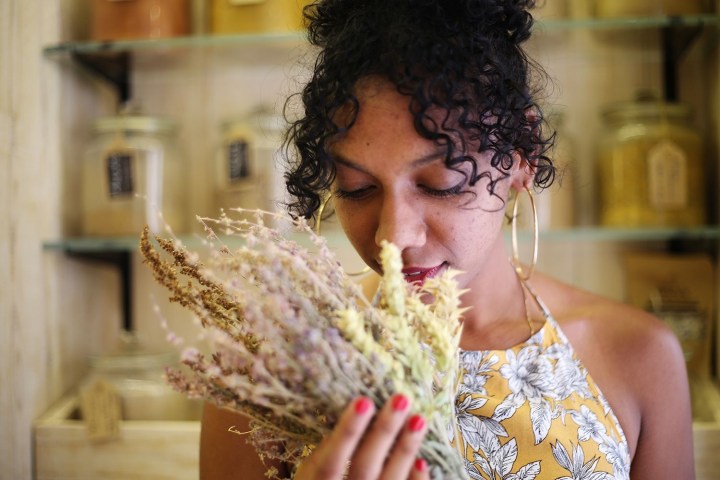 a close up of a person eating a sandwich