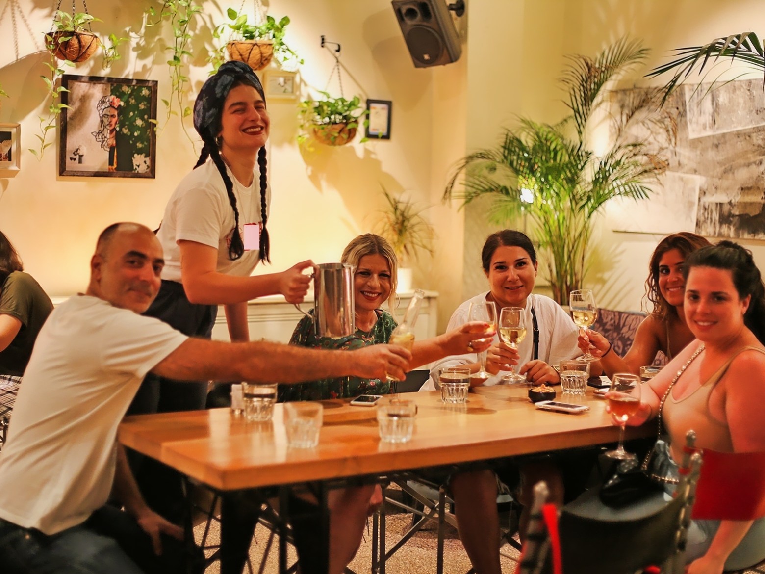a group of people sitting at a table