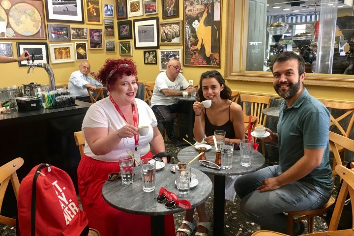 Melissa Kazan et al. sitting at a table