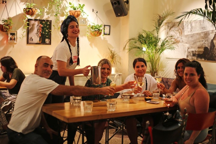 a group of people sitting at a table