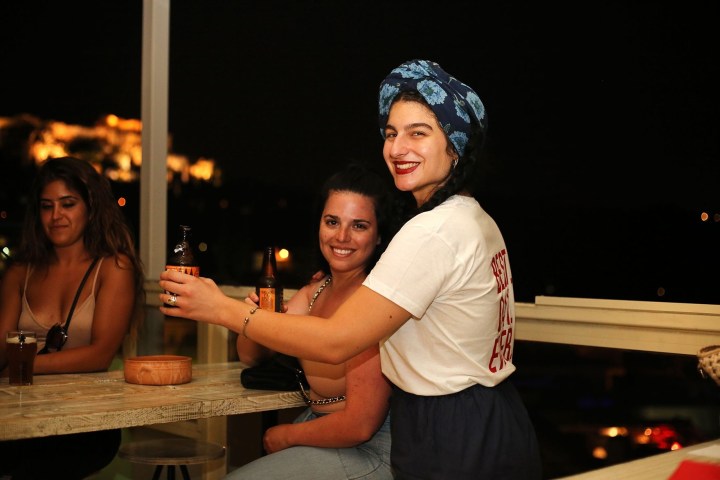 a man and a woman holding a wine glass