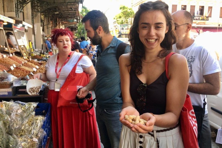 a group of people standing next to a person