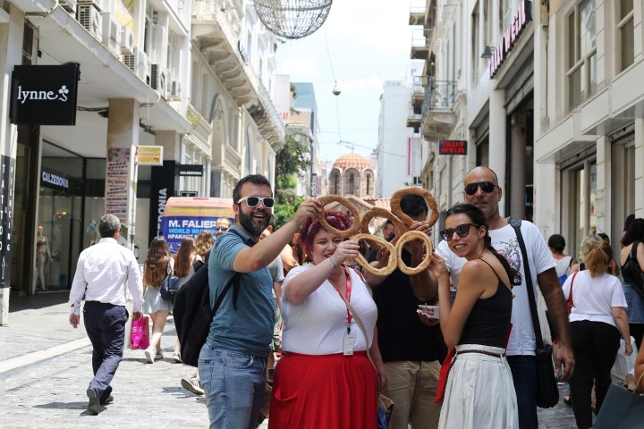 a group of people that are standing in the street