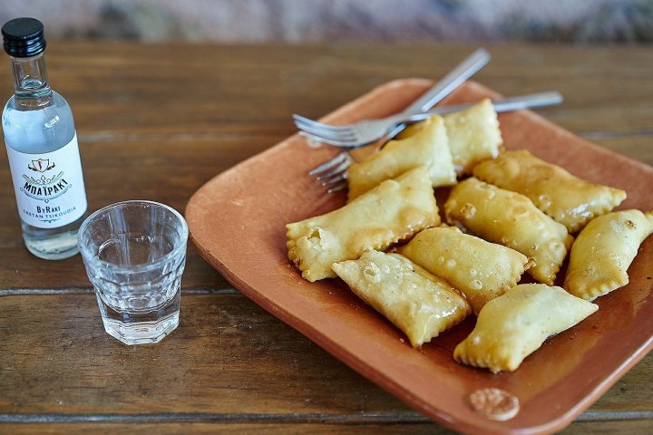a sandwich sitting on top of a wooden table