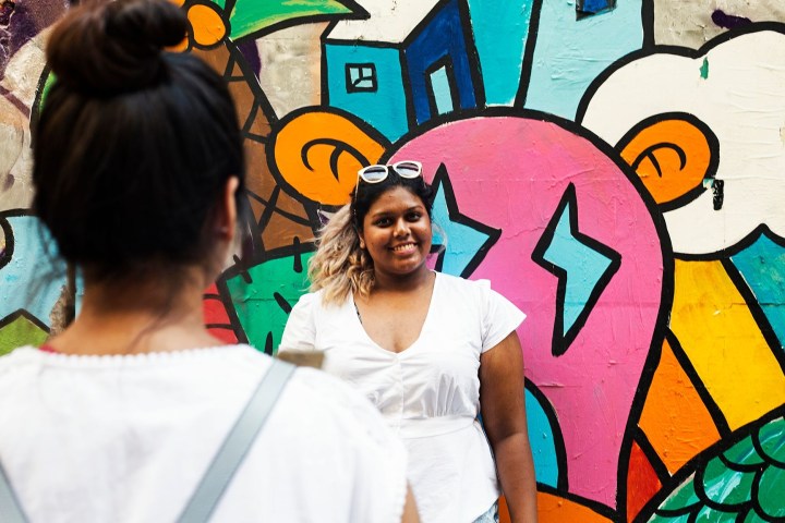 a person holding a sign