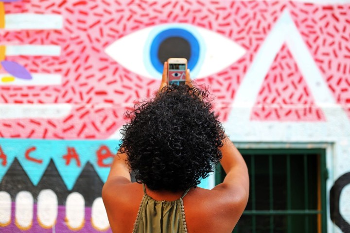 a person standing in front of a building