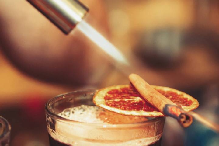 a close up of a beverage in a glass cup on a table